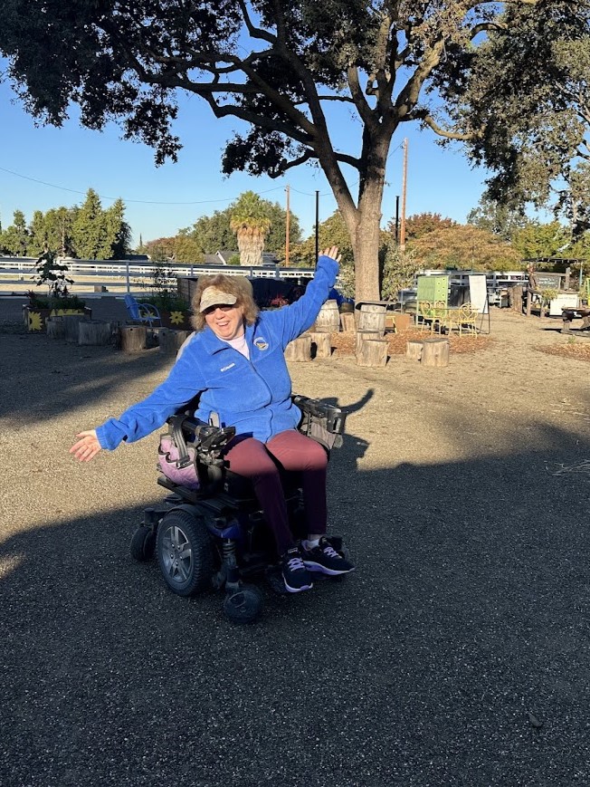 Participant on new accessible garden pathway