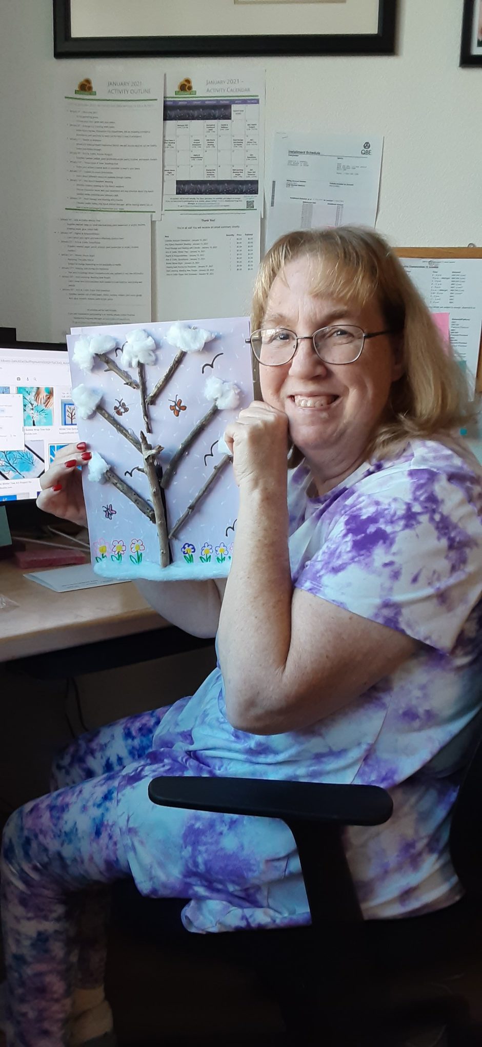 Jennifer with tree art she made