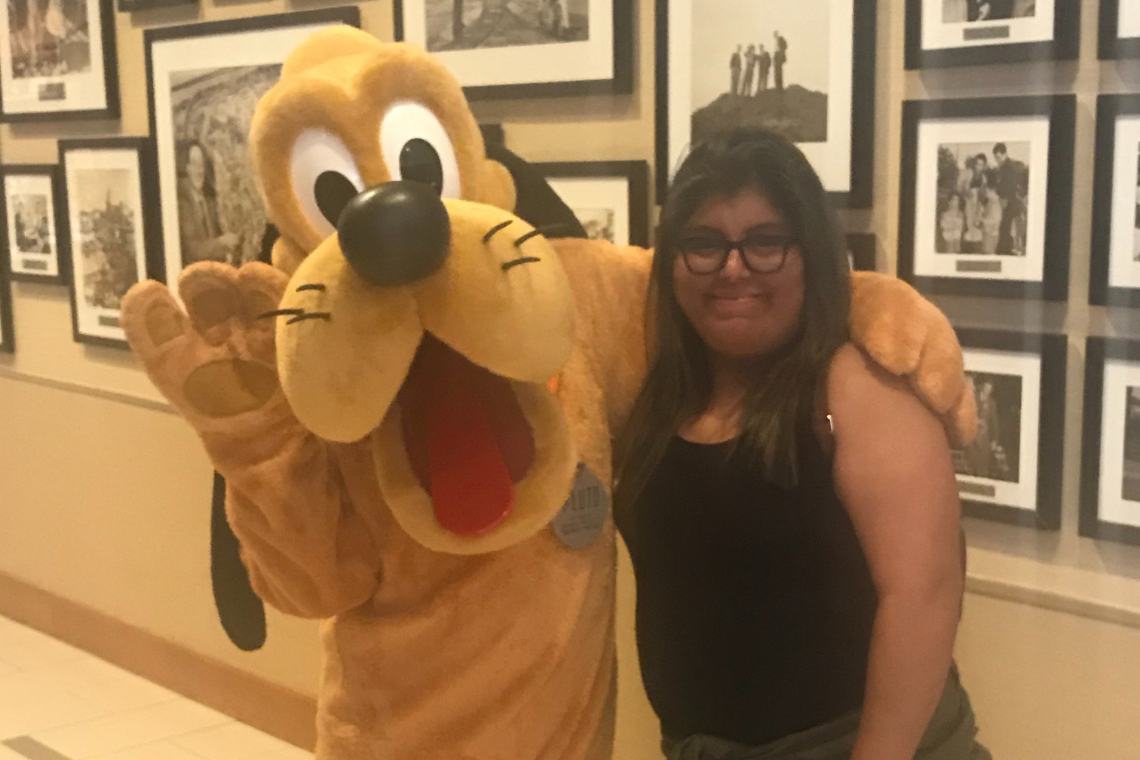 Jennifer with Disney character Goofy