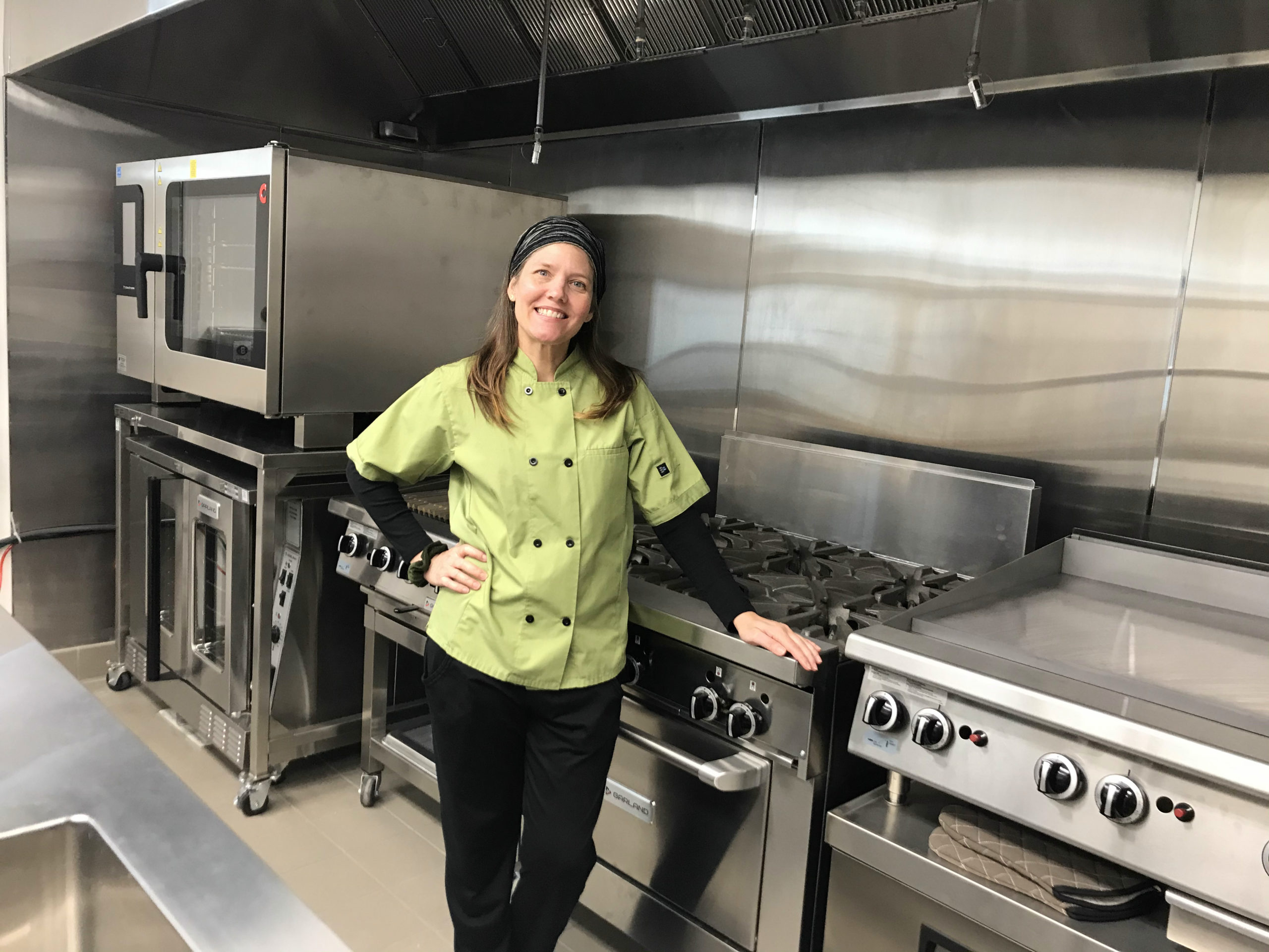 Chef Claudia Castillo Holley in the Sunflower Hill at Irby Ranch Kitchen
