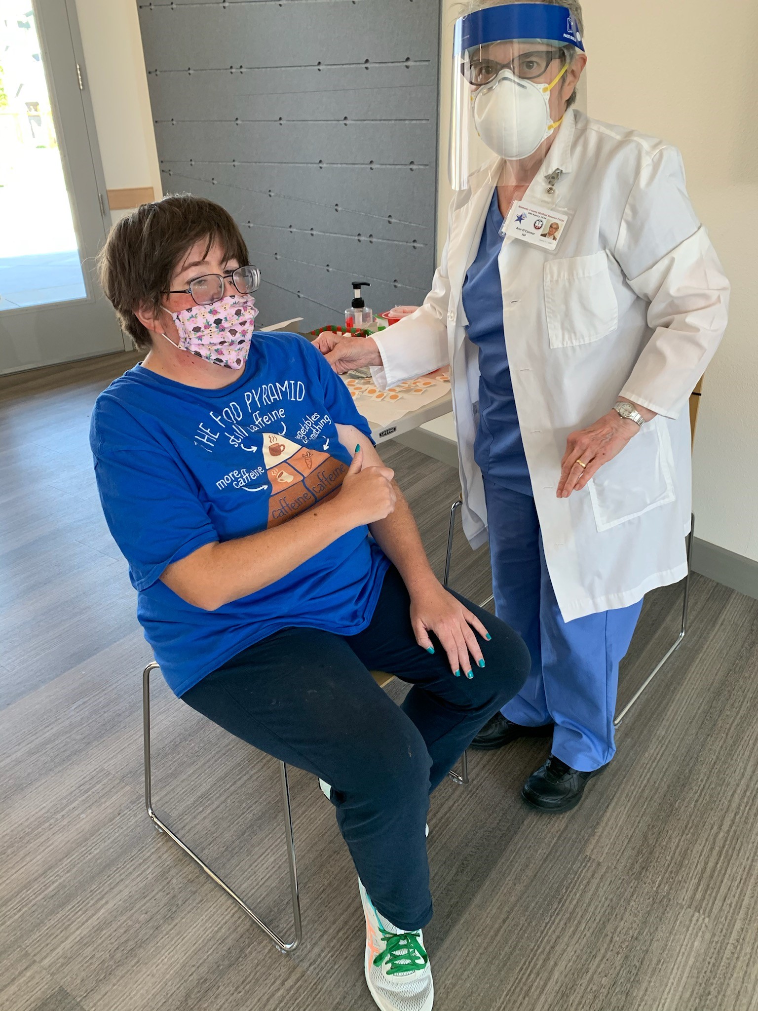 Shannon receiving her COVID vaccine